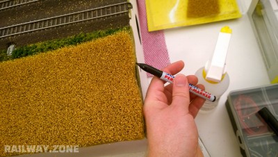 Marker klippelinjer med en tusch
